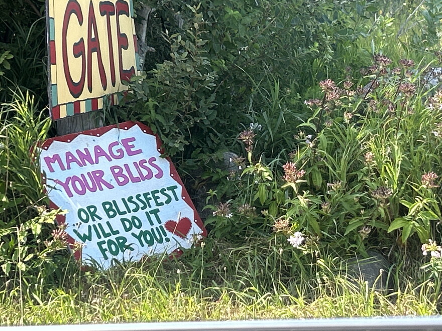 A sign made for welcoming Blissfest attendees to the property sits by the road on Aug. 19, a month after this year’s festival.