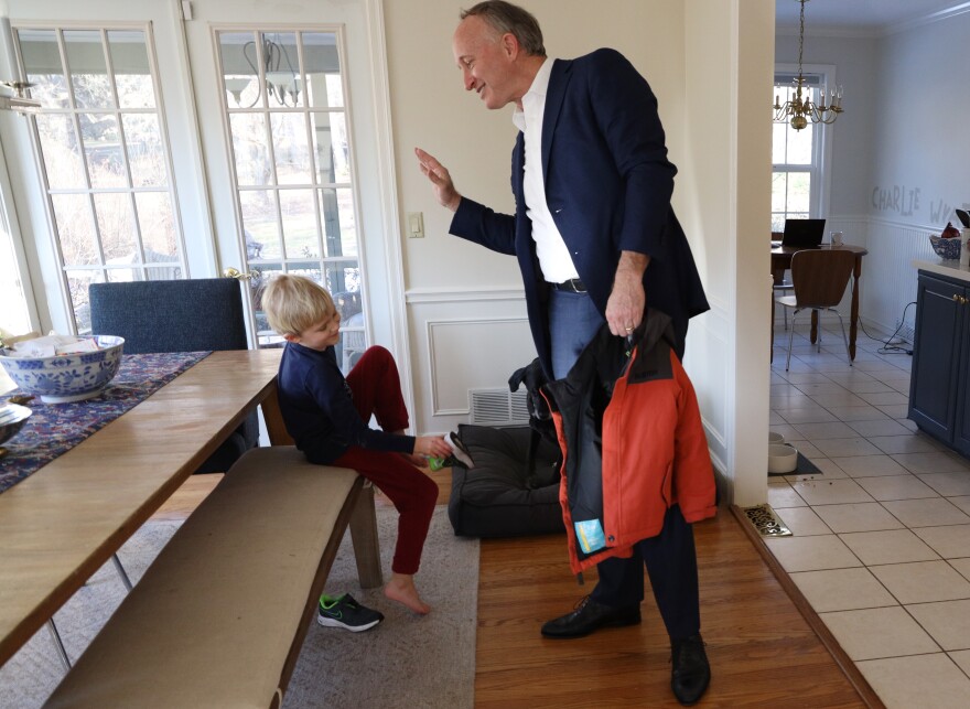 Douglas Maguire and his 6-year-old son, Charlie, in their Pittsford home.