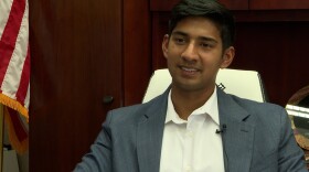 Mayor Sakbun sits at his desk.