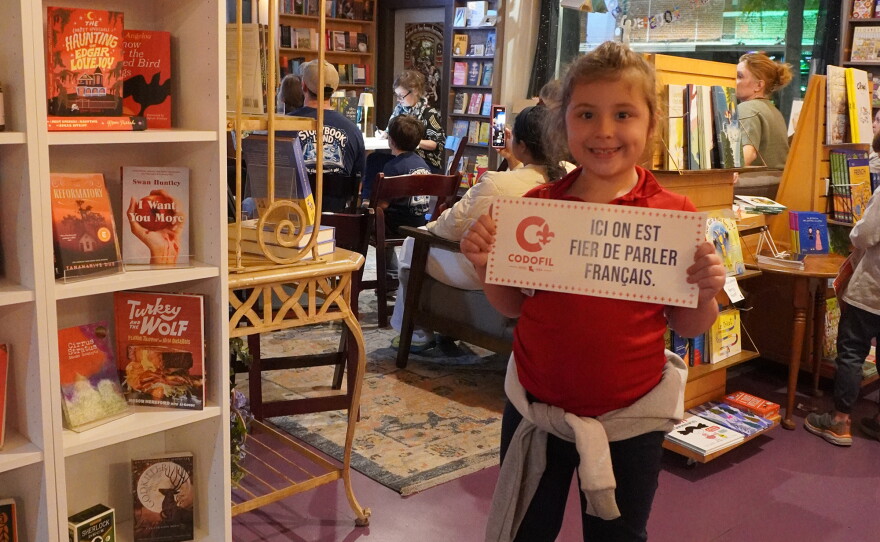 image of a little girl at the French Book Fest