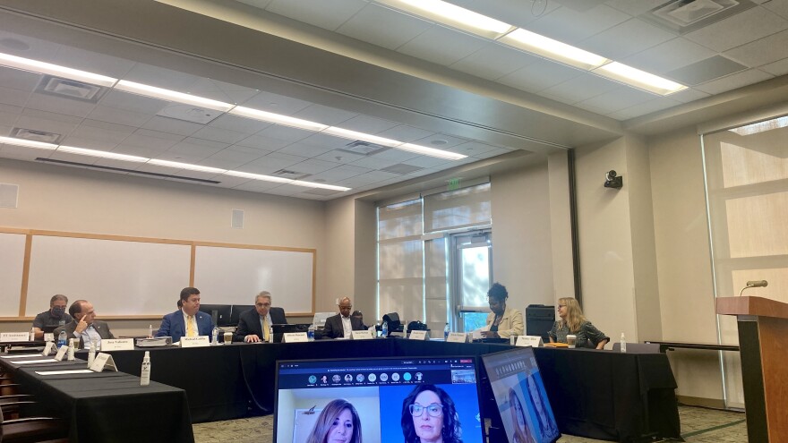 The USF presidential search committee sits at a roundtable in in the Patel Center at the USF Tampa campus to discuss what traits they think the next USF president should have.