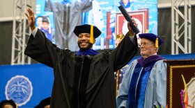 Pictured: Soca artist and cultural ambassador Adam O celebrates after receiving an honorary Doctor of Humane Letters degree during UVI’s 62nd Commencement Ceremony on the Orville E. Kean Campus on St. Thomas.