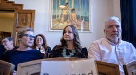 New Mexico Rep. Rebecca Dow (R-Truth of Consequences), center, waits with her husband Aaron Dow, right, and Rachel Gudgel, general counsel for House Republicans, for the start of her hearing in the New Mexico Supreme Court, in Santa Fe on April 21, 2026. (Eddie Moore/Albuquerque Journal)