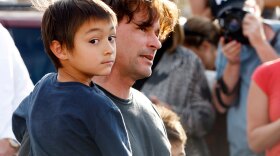 Six-year-old Falcon Heene with his father, Richard, outside the family's home in Fort Collins, Colo., in October.