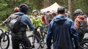Muddy mountain bikers gather at the grand opening of the Thunder Mountain Bike Park on Aug. 30, 2026.
