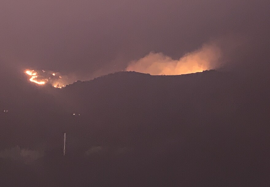 The Red Wing Canyon community remains under evacuation as the Stockton Hill Fire burns north of Kingman.