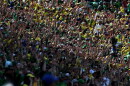 Oregon fans dance to "Shout" during the second half of an NCAA college football game against Boise State, Saturday, Sept. 5, 2026, in Eugene, Ore.