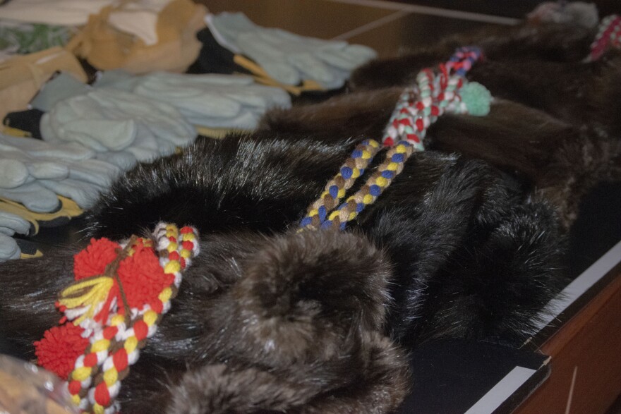 Yukon Quest volunteer Corrima Cadzow and her aunt, Louie Fairchild crafted five pairs of beaver mittens for the competitors. (Shelby Herbert/KUAC)