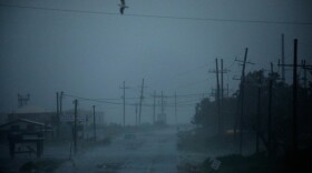 Heavy rain falls as storm surge begins to encroach on Louisiana Route 1 ahead of Hurricane Ida in Golden Meadow, Louisiana, U.S., on Sunday, Aug. 29.