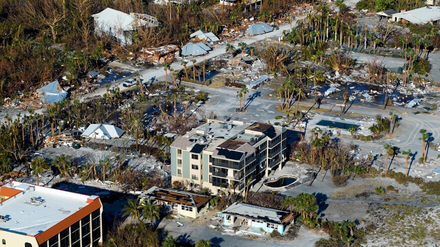 Damaged homes and debris are shown in the aftermath of Hurricane Ian on Sept. 29, 2022, in Fort Myers.