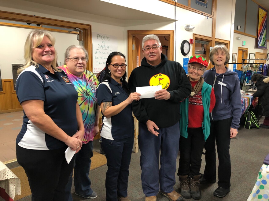 Veterans of Foreign Wars Auxiliary members donate a check to Bethel Search and Rescue during the 2019 #BethelGives campaign at the Bethel Cultural Center.