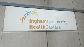 A sign on a building that reads 'Ingham Community Health Centers'