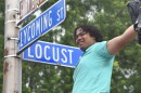 Tre Brown unveils the new Gary Brown Jr. Way sign, dedicated after his father.