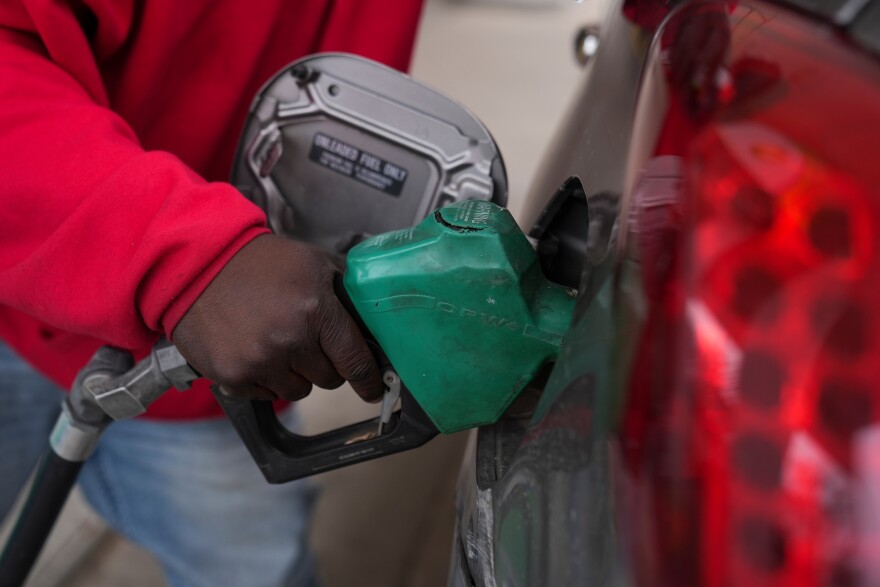 Dave Thomas purchases gasoline at a station on Tuesday, March 24, 2026, in Chicago. 