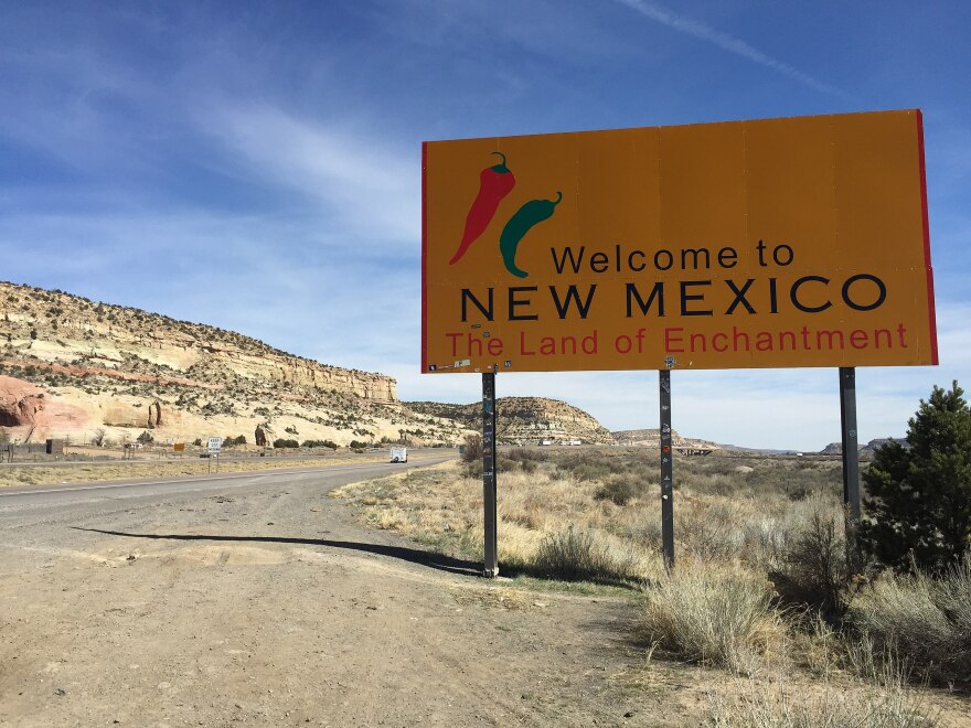 A sign on Interstate 40 welcomes drivers to New Mexico from Arizona — one of several surrounding states that have enacted abortion restrictions since Roe v. Wade was overturned last year. New Mexico legislators passed a law Friday that would enshrine in law protections for abortion clinicians and patients from other states, protecting them from harassment, threats, discipline or criminalization for care provided or received in New Mexico. Gov. Michelle Lujan Grisham, who issued an executive order with similar protections last year, is expected to sign the bill into law.