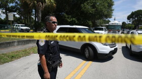 Police tape marks off the entrance to the apartment building where shooting suspect Omar Mateen is believed to have lived on June 12, 2016 in Fort Pierce, Florida.  ( Joe Raedle/Getty Images)