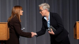 Republican state Sen. Christine Drazan, left, and Democratic Gov. Tina Kotek shake hands at the end of the gubernatorial debate in Eugene, Ore. at the University of Oregon, on Thursday, Oct. 1, 2026.