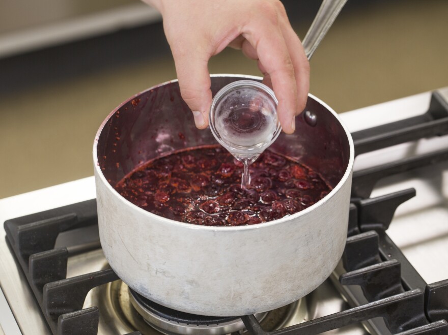 This cranberry sauce recipe calls for orange zest as well as orange liqueur like Grand Marnier.