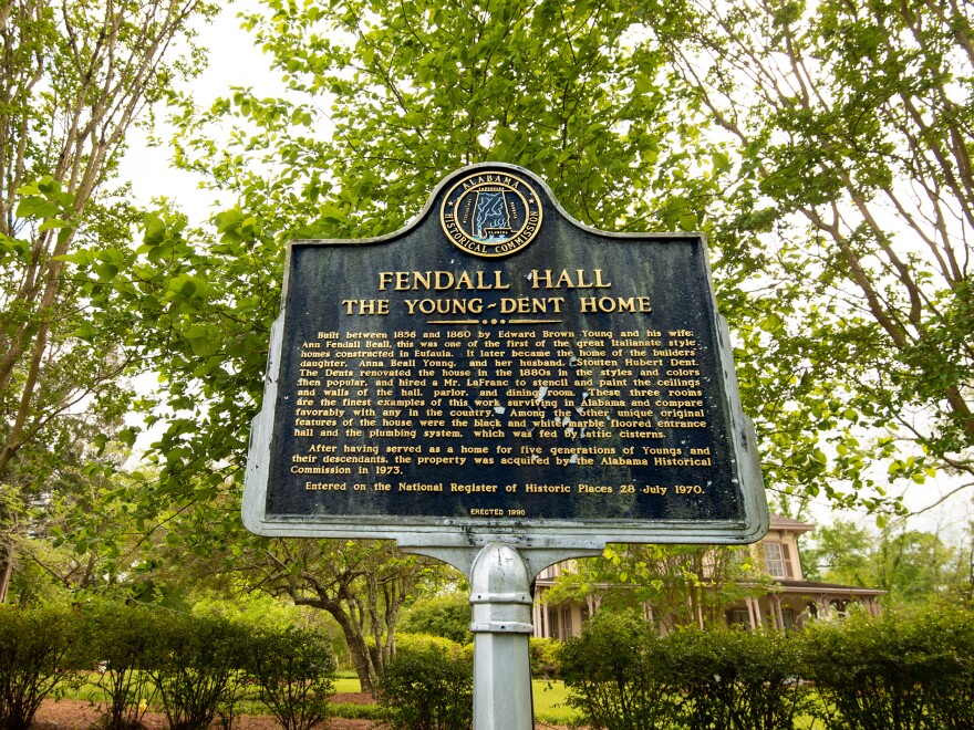 The historical marker that omits parts of the Young-Dent family's past is on the grounds of Fendall Hall in Eufaula. The back side of the marker says Edward Brown Young was a "banker, merchant and entrepreneur." The back side also says that he "organized the company which built the first bridge" in Eufaula and that his daughter married a Confederate captain in the "War Between the States."
