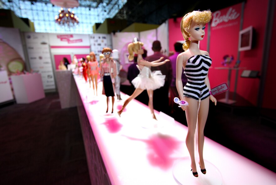 The 50th anniversary of Barbie, in 2009, was commemorated in New York by a lineup of Barbie dolls from different eras, starting with the original in a black-and-white swimsuit.