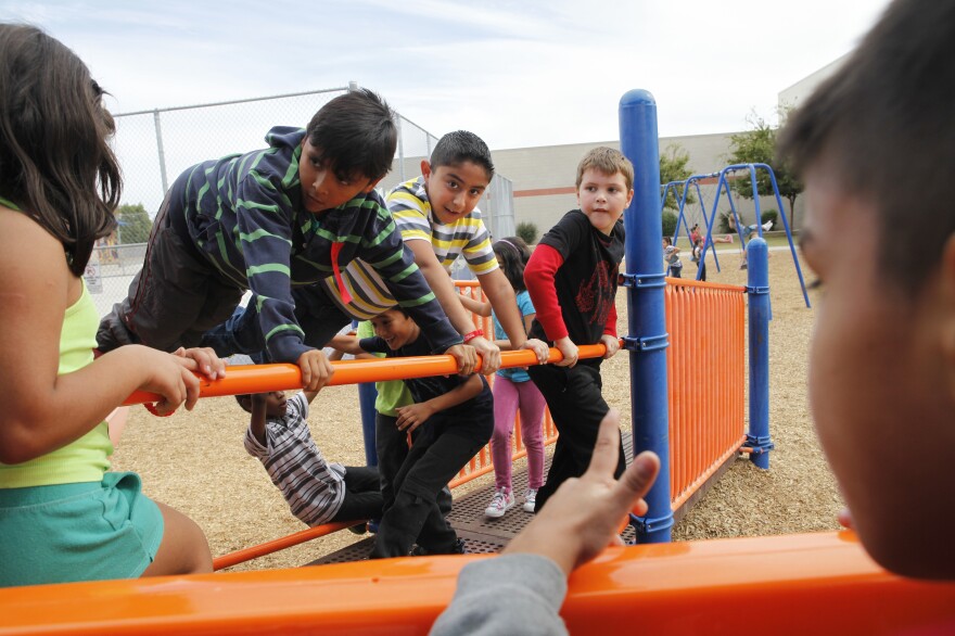 Humberto Araujo (center) is a second-grader who was identified as gifted at Echo Mountain Primary School in Arizona. If he went to a school across the state, it's possible he would never have been noticed.