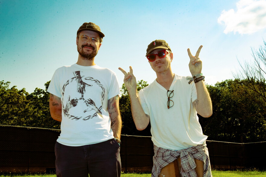 two men posing for a photograph 