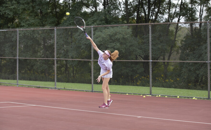 Cara Evans serves during practice.