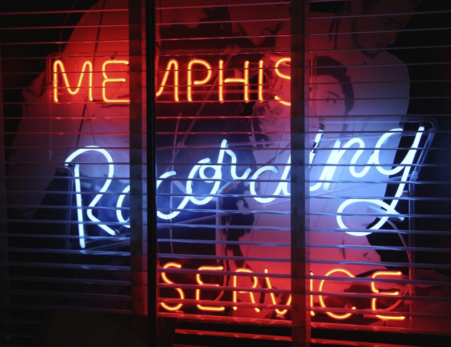 Vintage neon in Memphis Recording Service window