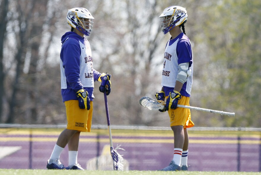 Miles Thompson (left) and his brother Lyle Thompson of New York are finalists for the Tewaaraton Award, college lacrosse's equivalent of the Heisman.