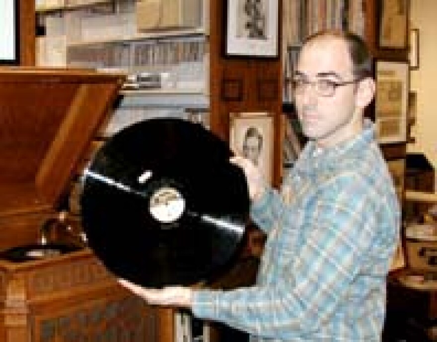 Website devloper Scott O'Kelly displays 16\" transcription from World War II era.