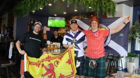 At left: Frankie Livingston, Tyler White, Andrew Moody and Steff Williamson support Scotland at Yamas Greek restaurant in downtown Concord on Friday, Jun. 12 ahead of Scotland's first World Cup match.