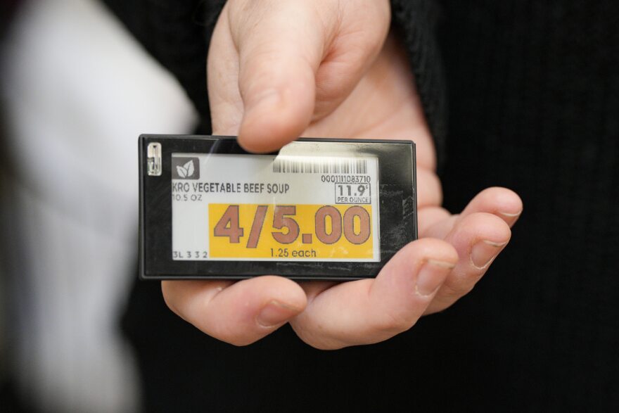 FILE - Electronic grocery labels are displayed at a Kroger grocery store, in Monroe, Ohio.