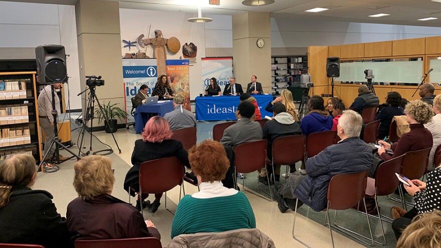 Akron residents and officials gathered in the Akron-Summit County Public Library to discuss high eviction rates in the area. [Taylor Haggerty / ideastream]