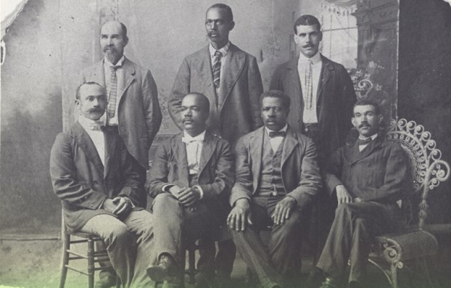 Black and white photo of seven african american men