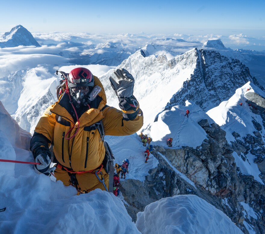 James "KG" Kagambi on Hillary Step on May 12, moments before summiting Mount Everest. He credits the sherpas with helping him and the other climbers stay safe on their journey to the peak.