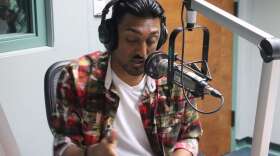 Ken Nai performs in the WMFE studios. Photo: Brendan Byrne