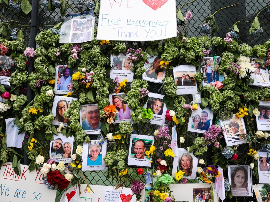 Family members hold a vigil this week for those who died and others who are missing in the Champlain Towers South condo collapse in Surfside, Fla.