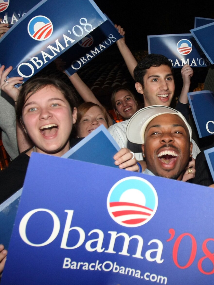 In 2008, Obama won the support of young and minority voters with his message of hope and change. Here, supporters of the then-presidential candidate cheer as they watch results from the Louisiana presidential primary in February 2008.