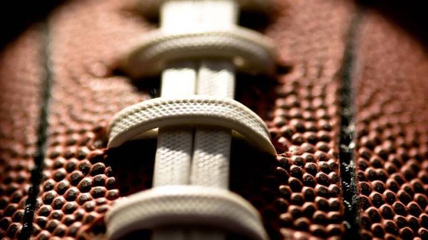 The Indiana High School Athletic Association has placed two northern Indiana football teams on probation and suspended six players and two coaches following a fight that forced officials to halt a game at halftime.