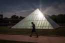 A student walks through the University of Missouri-St. Louis' campus Friday afternoon, May 19, 2017.