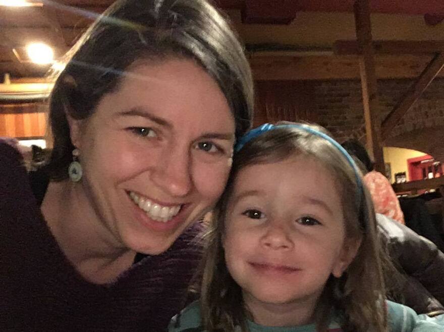 Avery Hoppa, with her 3-year-old daughter Zelda. Hoppa says she's "incredibly grateful" that she and her husband still have jobs. But she says it "feels weird to be a consumer right now" as many others are struggling financially.