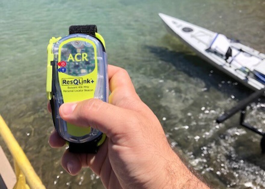 A Coast Guard service member holds an Emergency Position Indicating Radio Beacon (EPIRB) which had been activated after a 15-foot recreational vessel had capsized off Ko'Olina, Oahu, May 31, 2019. The EPIRB had allowed a coordinated rescue between the Coast Guard, Honolulu Fire Department and Ocean Safety. (U.S. Coast Guard photo by Petty Officer 2nd Class Mario Villani/Released)