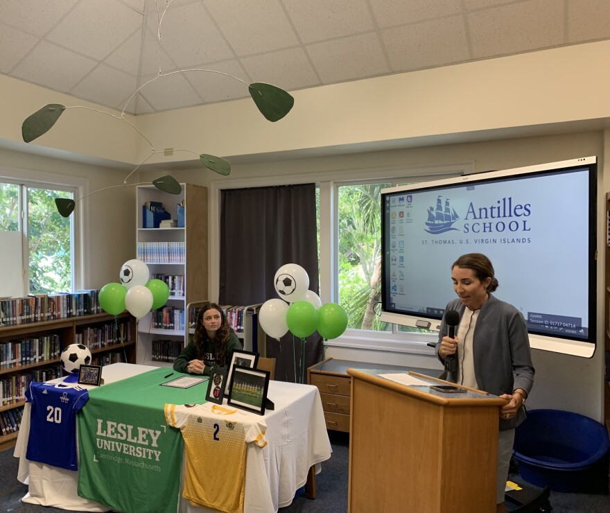 Antilles director of middle and upper school, Kim Barlowe, provides remarks.