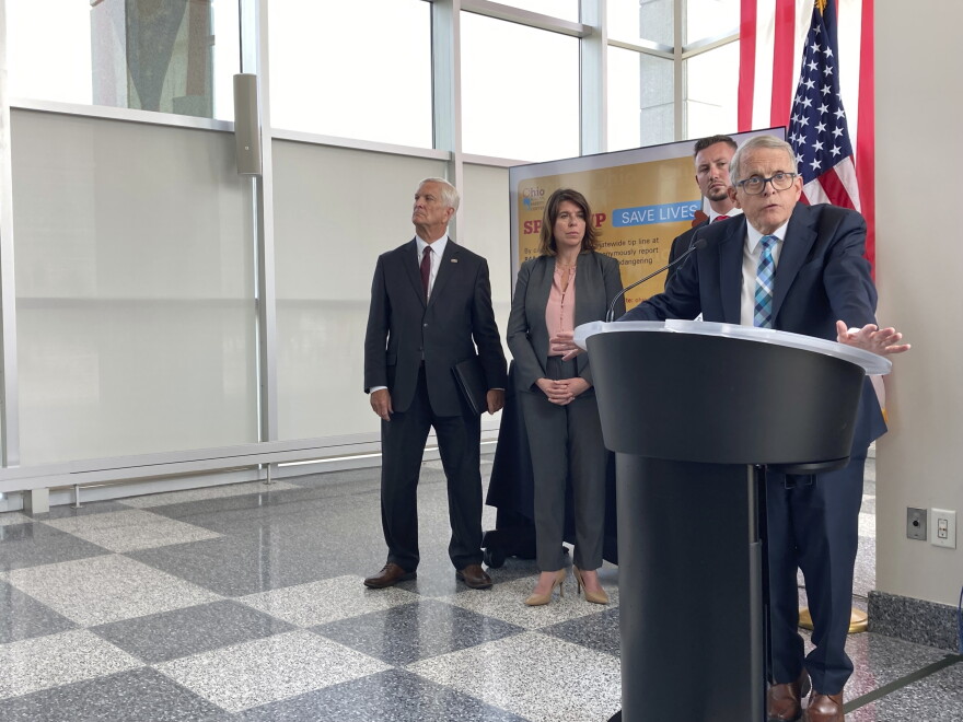 Ohio Gov. Mike DeWine discusses a law that gives school districts the option of arming trained school employees, on Monday, June 13, 2022, in Columbus, Ohio. The Republican DeWine signed the bill into law Monday and ordered the Ohio School Safety Center to require a maximum of 24 hours of initial training and eight hours of annual training. 