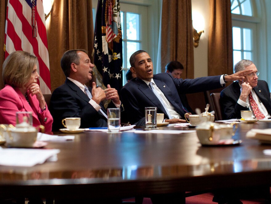 President Obama meets with congressional leaders in the Cabinet Room of the White House to discuss the debt limit and deficit reduction in July 2011.