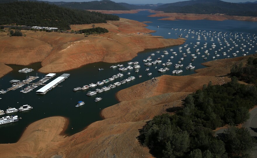Low water levels are visible in the Bidwell Marina at Lake Oroville in August 2014.
