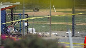 Softballs are strewn on a field at the scene of a multiple shooting involving a member of House Majority Whip Steve Scalise of La., Wednesday, June 14, 2017, in Alexandria, Va.  (Cliff Owen/AP)
