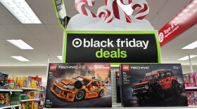 Signs mark special prices on toys as retailers roll out Black Friday deals, Wednesday, Nov. 26, 2025, in a Target store in southeast Denver.