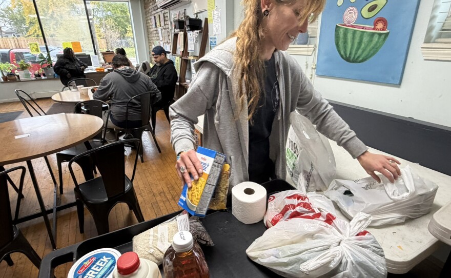 Lindsay Winkler shops at a food pantry in Grand Rapids.