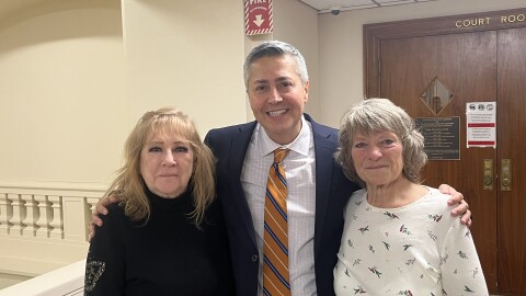 Mary Hartshorne, Louis Lopez and Anne Hotaling in the Schenectady County Courthouse.